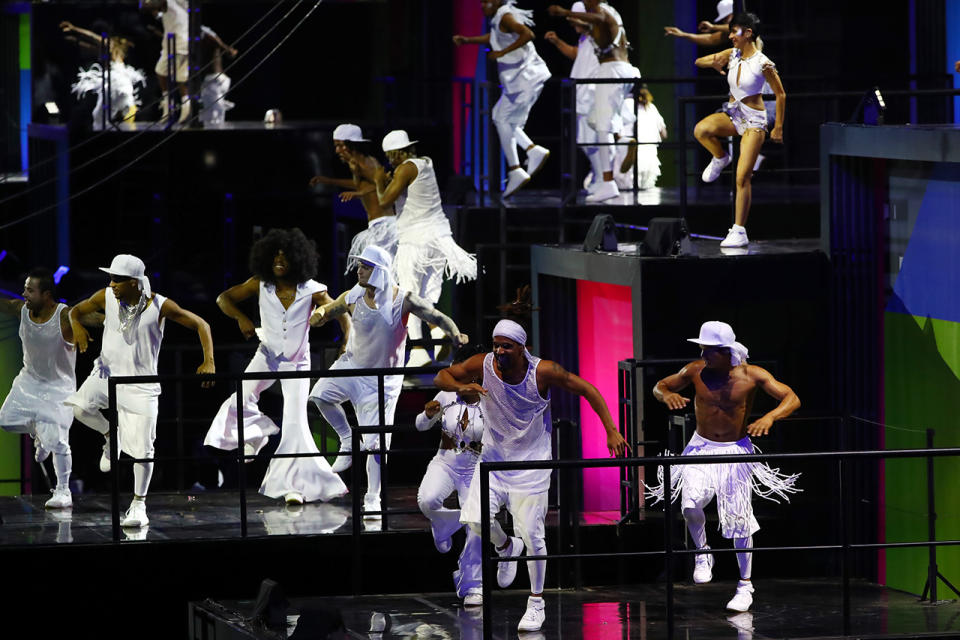 <p>Dancers perform during the Metropolis segment of the Opening Ceremony of the Rio 2016 Olympic Games at Maracana Stadium. (Photo by Elsa/Getty Images) </p>