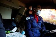 eong, a parcel delivery worker for Hanjin Transportation, drives his truck in Gwangju