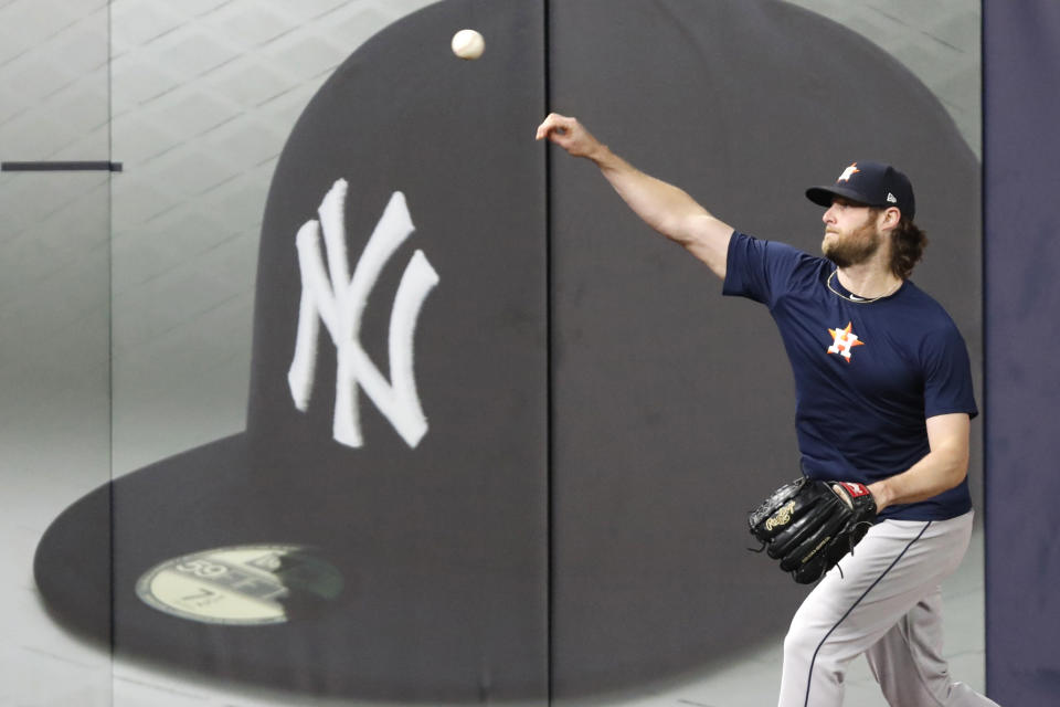 Houston Astros Game 3 starting pitcher Gerrit Cole throws on the field at Yankee Stadium, Monday, Oct. 14, 2019, in New York, after the team arrived to prepare for the American League Championship Series which continues Tuesday against the New York Yankees. (AP Photo/Kathy Willens)