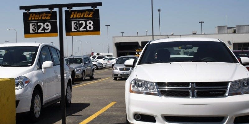 Hertz rental cars are seen in a rental lot near Detroit Metropolitan airport in Romulus, Michigan, May 9, 2011. REUTERS/Rebecca Cook