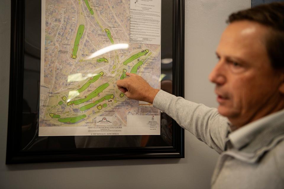 Mike Bennett, one of the operators with Commonwealth Golf Partners, views a new master plan of the Asheville Municipal Golf Course, October 18, 2023.