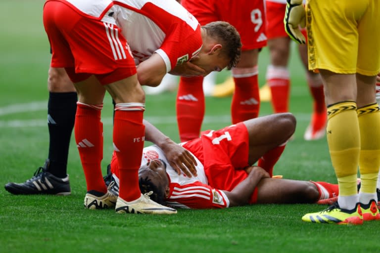 L'attaquant français du Bayern Kingsley Coman, blessé lors du match contre Cologne, le 13 avril 2024 à Munich (Michaela STACHE)