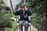 Steven Melnikoff, 99, of the 175th regiment of the 29th infantry division and is one of the few veterans left who took part to the D-Day landings on June 06, 1944, adjusts his cap during an interview with the Associated Press Friday, Aug.23, 2019 in Paris. Melnikoff was part of a group of World War II veterans taking part in commemorations of the 75th anniversary of the Allied operation to liberate Paris from Nazi occupation. (AP Photo/Daniel Cole)