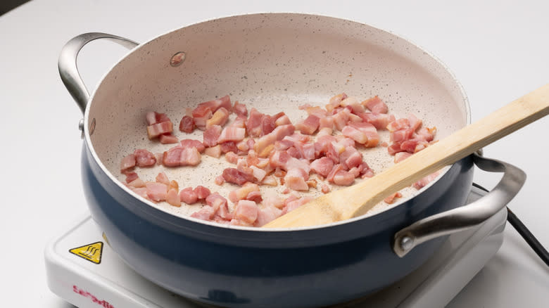 frying pancetta in a pan