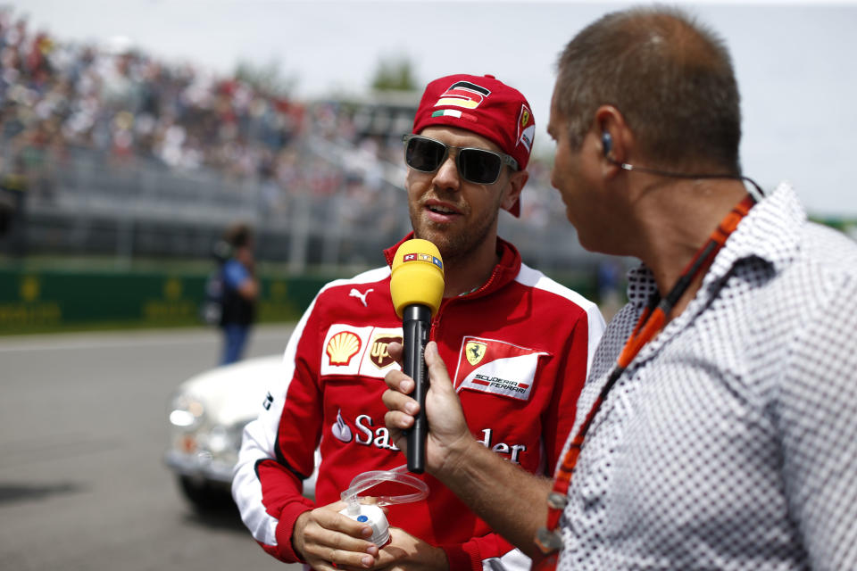  Kai Ebel im Gespräch mit Sebastian Vettel im Jahr 2015. (Bild:Getty Images)