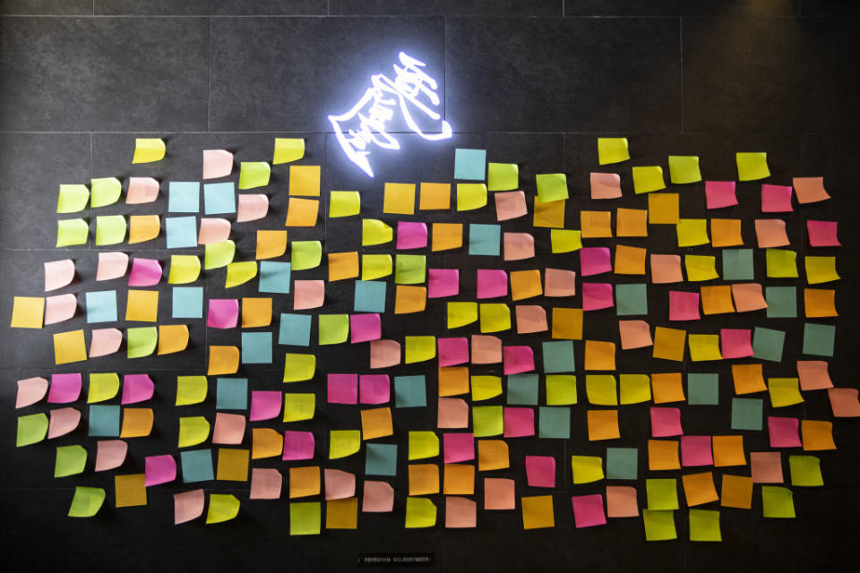 Blank sticky notes are displayed inside a restaurant in Hong Kong on July 8, 2020. | Chan Long Hei—Bloomberg/Getty Images