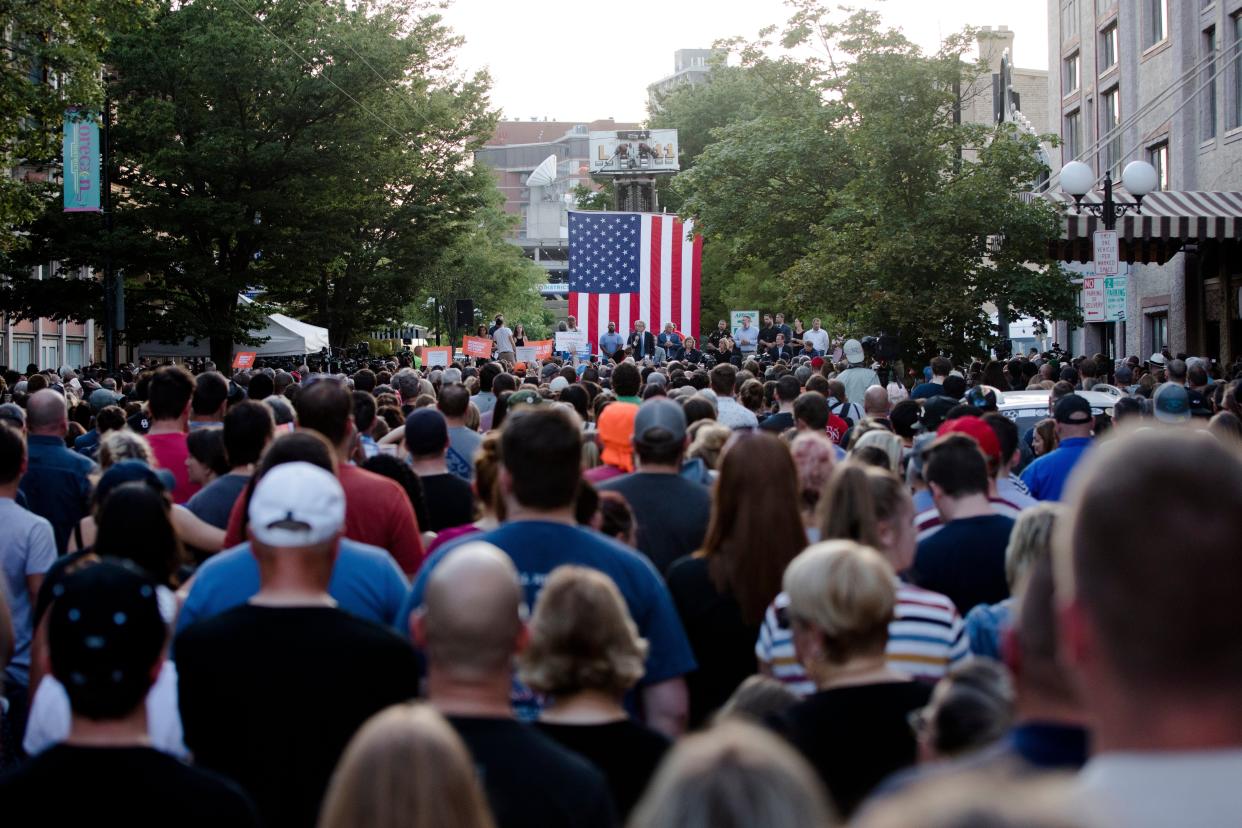 A crowd of mourners in Dayton plead with Gov. Mike DeWine to "do something" about gun violence in August 2019 after nine people were killed by a gunman in the city's Oregon District. Months later DeWine introduced his "Strong Ohio" reform package but it failed to gain traction with lawmakers.