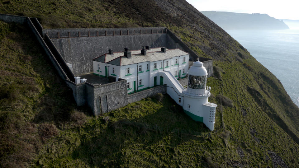 <p>Want to feel the thrill of living life on the edge? Then check into this cliffside cottage on Exmoor Heritage Coast, where the actual lighthouse is still in operation. Comprised of six chic bedrooms, it features great balcony for bird watching and is excellently located for coastal walks. From £813 for three nights from October 17. [Photo: National Trust] </p>