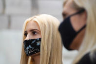 Ivanka Trump, center, listens during a tour at the Georgia Center for Child Advocacy on Monday, Sept. 21, 2020, in Atlanta. (AP Photo/Brynn Anderson)