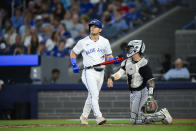 Toronto Blue Jays' Daulton Varsho (25) reacts after striking out during the eighth inning of the team's baseball game against the Chicago White Sox on Tuesday, May 21, 2024, in Toronto. (Christopher Katsarov/The Canadian Press via AP)
