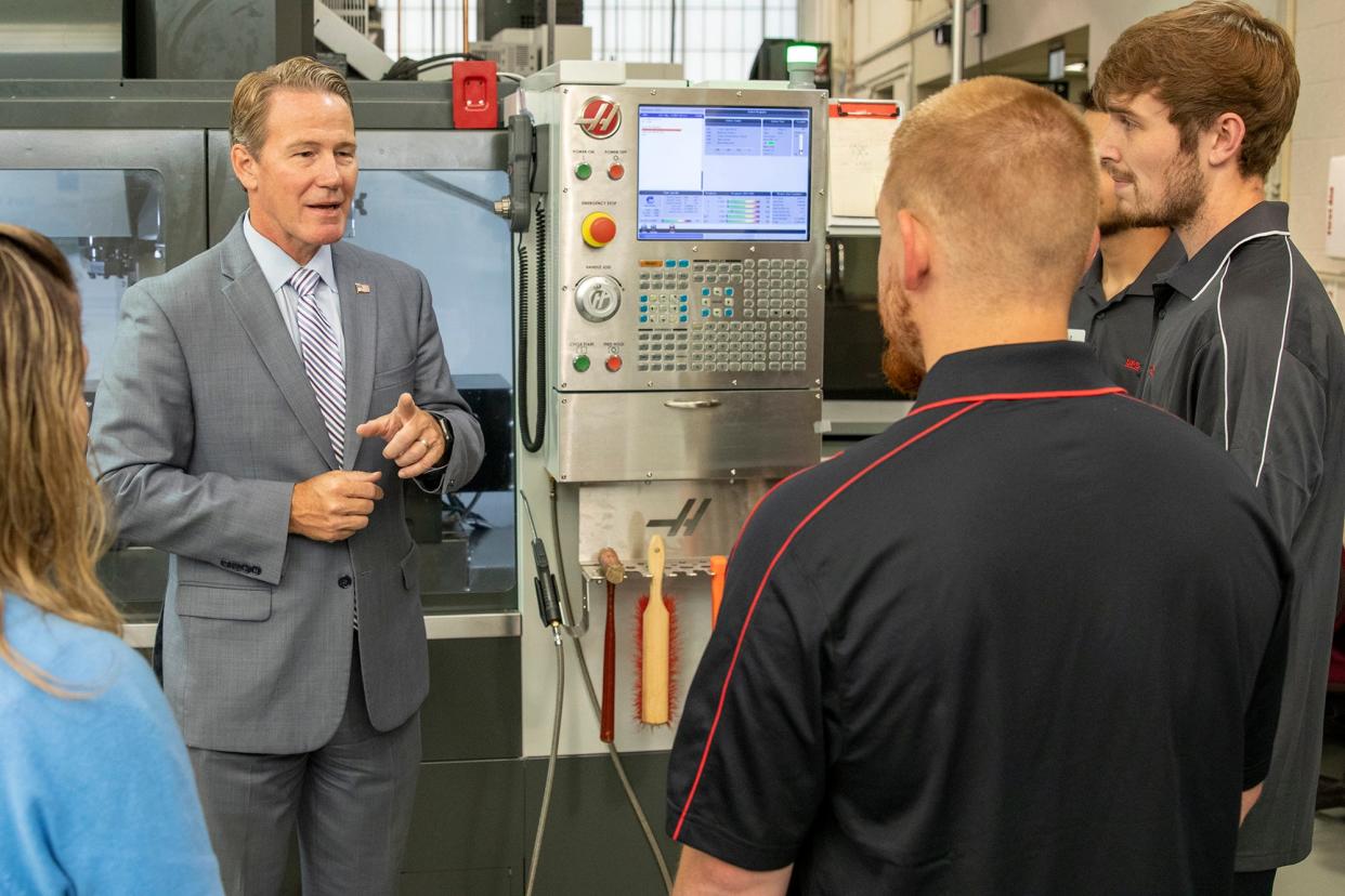 Lt. Gov. Jon Husted talks with Stark State College students Thursday morning about training they received in the W.R. Timken Advanced Manufacturing Lab. Husted also discussed workforce need during a roundtable with area business leaders. (Photo courtesy Stark State)