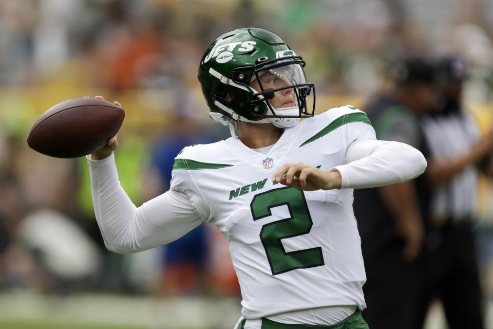 New York Jets' Zach Wilson warms up before a preseason NFL football game against the Green Bay Packers Saturday, Aug. 21, 2021, in Green Bay, Wis. (AP Photo/Matt Ludtke)