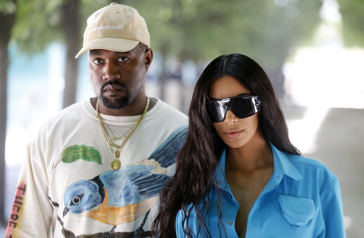 PARIS, FRANCE - JUNE 21:  Kanye West and Kim Kardashian attend the Louis Vuitton Menswear Spring/Summer 2019 show as part of Paris Fashion Week Week on June 21, 2018 in Paris, France.  (Photo by Chesnot/WireImage)