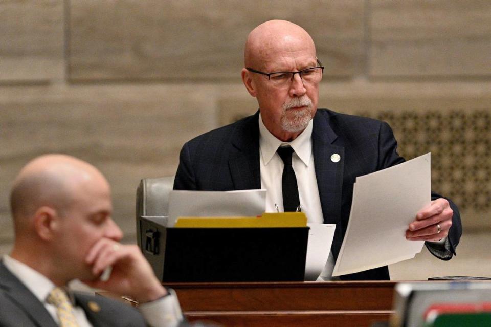 Sen. Mike Cierpiot, R-Lee’s Summit, reads a bill Missouri during the afternoon session as Missouri senators convene at the state capitol in Jefferson City Wednesday, Feb. 23, 2022.