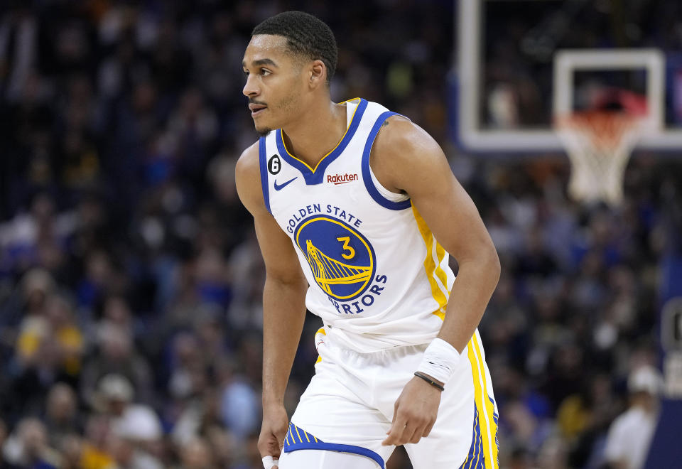 SAN FRANCISCO, CALIFORNIA - OCTOBER 14: Jordan Poole #3 of the Golden State Warriors looks on against the Denver Nuggets during the first half of an NBA basketball game at Chase Center on October 14, 2022 in San Francisco, California. NOTE TO USER: User expressly acknowledges and agrees that, by downloading and or using this photograph, User is consenting to the terms and conditions of the Getty Images License Agreement. (Photo by Thearon W. Henderson/Getty Images)