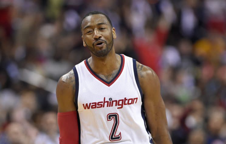 John Wall finds his happy place. (AP)
