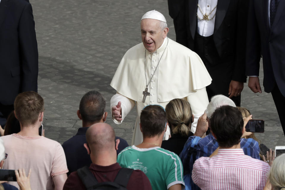 Pope Francis arrives for his general audience, the first with faithful since February when the coronavirus outbreak broke out, in the San Damaso courtyard, at the Vatican, Wednesday, Sept. 2, 2020. (AP Photo/Andrew Medichini)