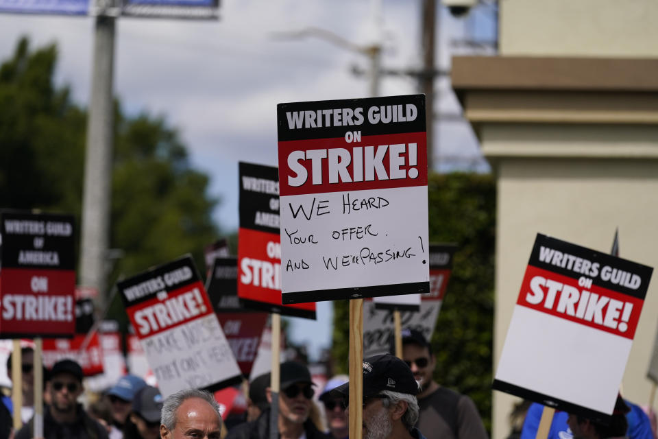 The Hollywood writers' strike lasted nearly 150 days. A similar actors' strike is ongoing. (AP Photo/Ashley Landis)