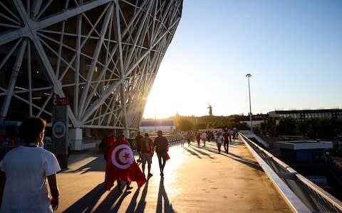  General view of Volgograd Arena as fans of Tunisia walk around during sunset prior to the 2018 FIFA World Cup Russia group G match between Tunisia and England - Credit: GETTY IMAGES