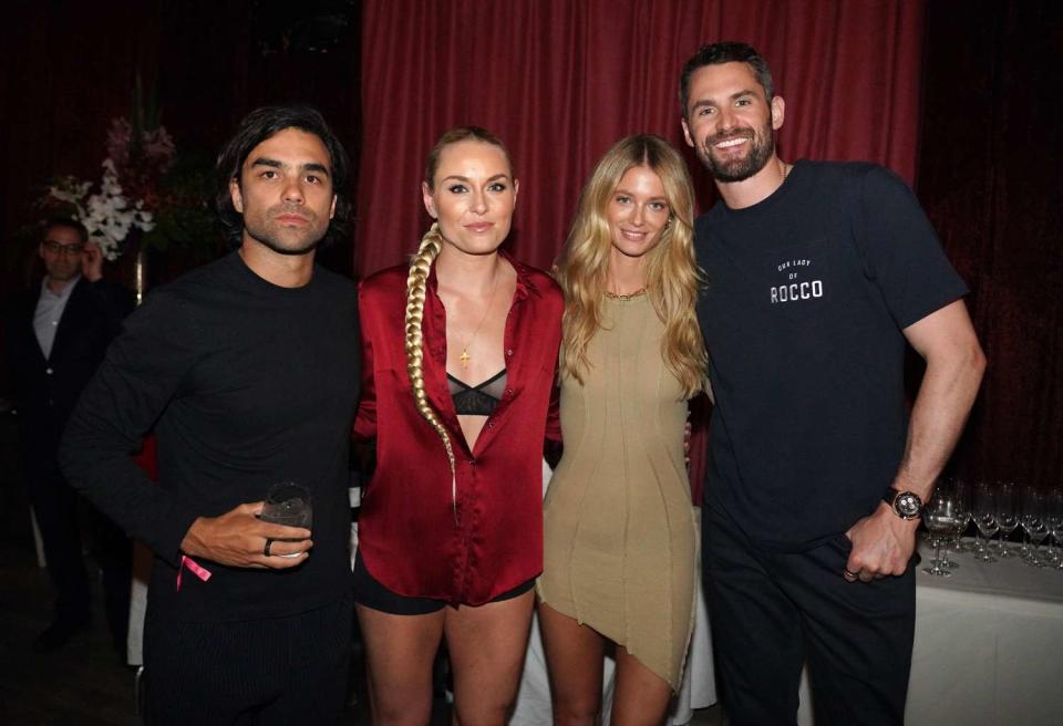 Diego Osorio, Lindsey Vonn, Kate Bock and Kevin Love attend Day 4 of American Express Presents CARBONE Beach at Carbone on May 08, 2022 in Miami Beach, Florida