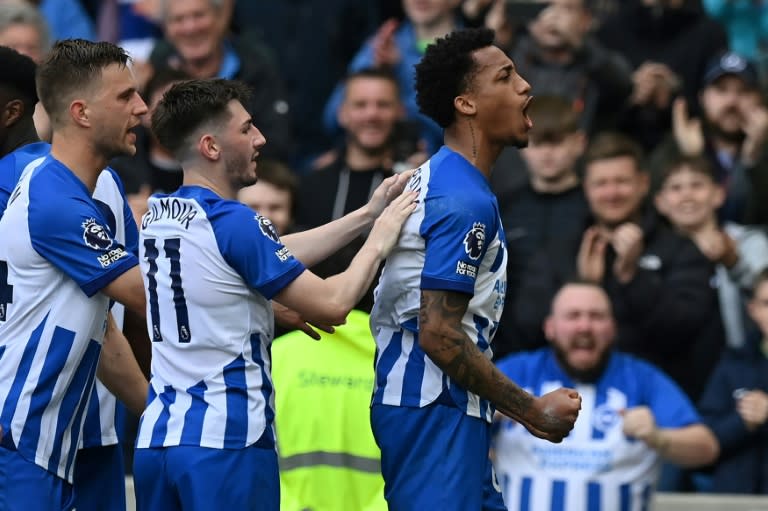 Brighton's Joao Pedro (R) celebrates after scoring against Aston Villa (Glyn KIRK)