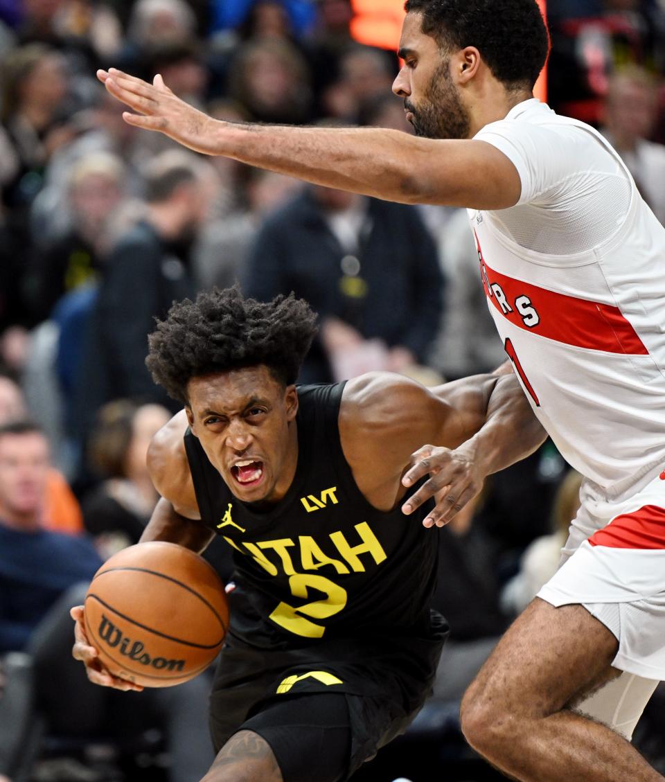 Utah Jazz guard Collin Sexton (2) drives on Toronto Raptors center Jontay Porter (11) as the Jazz and Raptors play at the Delta Center in Salt Lake City on Friday, Jan. 12, 2024. Utah won 145-113. | Scott G Winterton, Deseret News