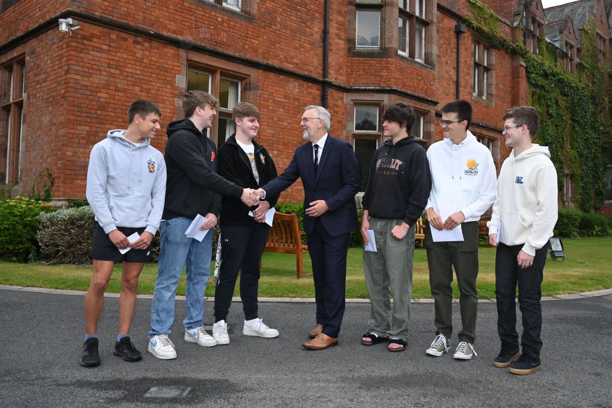 There were celebrations at schools across Belfast as students opened their A-level results (Michael Cooper/PA) (PA Media)