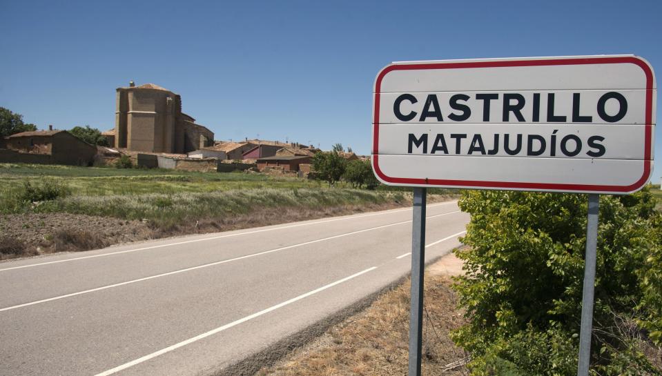 A sign with the name of the village of Castrillo Matajudios (Kill Jews Fort) is seen near its entrance in northern Spain May 16, 2014. The village of Castrillo Matajudios, home to 56 mostly elderly people, in northern Spain will vote on May 25, 2014 on whether to change the name it has had for 400 years and purge a vestige of the religious persecution meted out by the Roman Catholic Inquisition. Village Mayor Lorenzo Rodriguez has led the drive to rename it Castrillo Mota Judios, or Hill of Jews. Picture taken May 16, 2014. To match SPAIN-VILLAGE/ REUTERS/Ricardo Ordonez (SPAIN - Tags: SOCIETY)