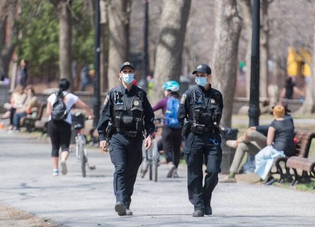 Some of the new mask rules appeared to be only irregularly followed last weekend, when parks across Montreal were jammed with people thanks to record-high temperatures. (Graham Hughes/The Canadian Press - image credit)