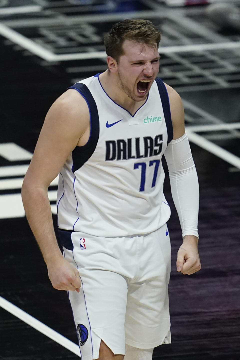 Dallas Mavericks guard Luka Doncic reacts after making a shot during the second quarter of Game 7 of an NBA basketball first-round playoff series against the Los Angeles Clippers, Sunday, June 6, 2021, in Los Angeles, Calif. (AP Photo/Ashley Landis)