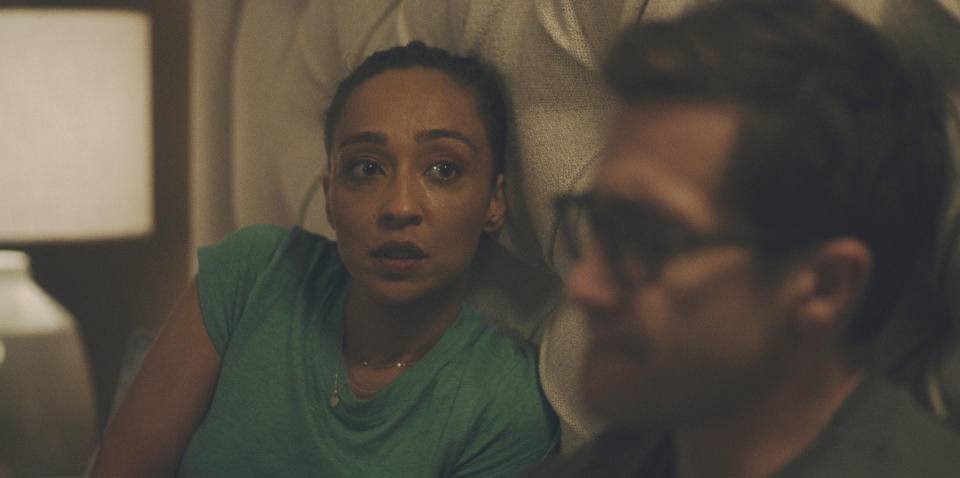 This image released by Apple TV+ shows Ruth Negga, left, and Jake Gyllenhaal in a scene from the series "Presumed Innocent." (Apple TV+ via AP)