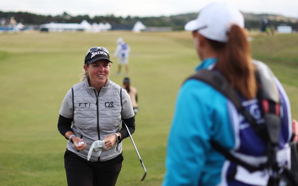 Ashleigh Buhai of South Africa interacts with their caddie after chipping in for a birdie on the seventeenth green during Day Three of the AIG Women's Open at Muirfield on August 06, 2022 in Gullane, Scotland. - R&amp;A 
