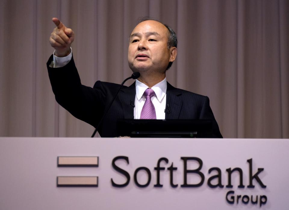 Japan's SoftBank Group CEO Masayoshi Son appoints a questioner during a press conference on the company's financial results in Tokyo on November 6, 2019. - Japanese giant SoftBank Group said Wednesday it suffered an operating loss of $6.4 billion in the second quarter, the worst in its history, taking a hit from investments in start-ups including WeWork and Uber. (Photo by Kazuhiro NOGI / AFP) (Photo by KAZUHIRO NOGI/AFP via Getty Images)