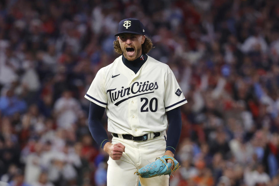 Minnesota Twins starting pitcher Chris Paddack reacts after strking out Houston Astros' Alex Bregman during the fifth inning of Game 4 of a baseball AL Division Series, Wednesday, Oct. 11, 2023, in Minneapolis. (AP Photo/Bruce Kluckhohn)