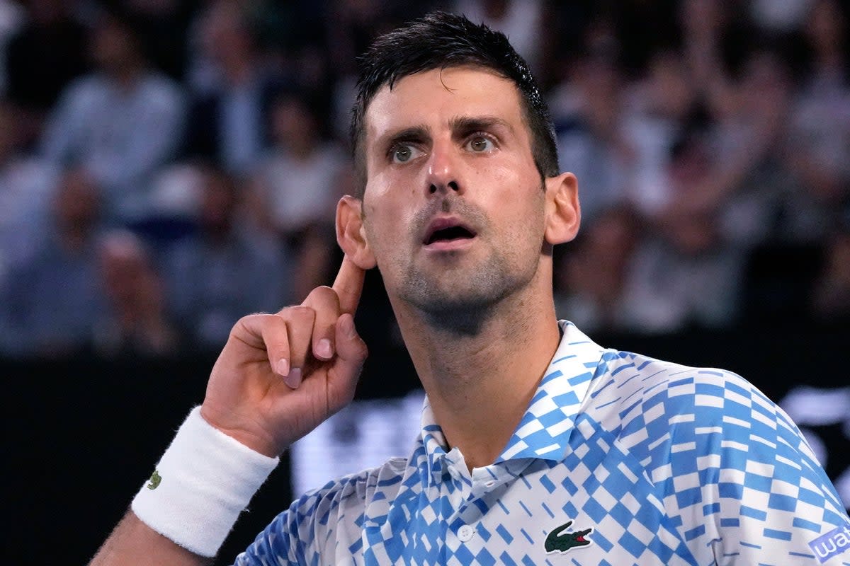 Novak Djokovic gestures to the crowd after winning the first set (Aaron Favila/AP) (AP)