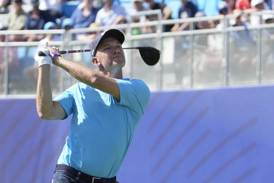 Former Ukrainian international soccer player Andriy Shevchenko plays his tee shot on the 1st hole during an all stars golf match between Team Colin Montgomerie and Team Cory Pavin at the Marco Simone Golf Club in Guidonia Montecelio, Italy, Wednesday, Sept. 27, 2023. The Ryder Cup starts Sept. 29, at the Marco Simone Golf Club. (AP Photo/Alessandra Tarantino)