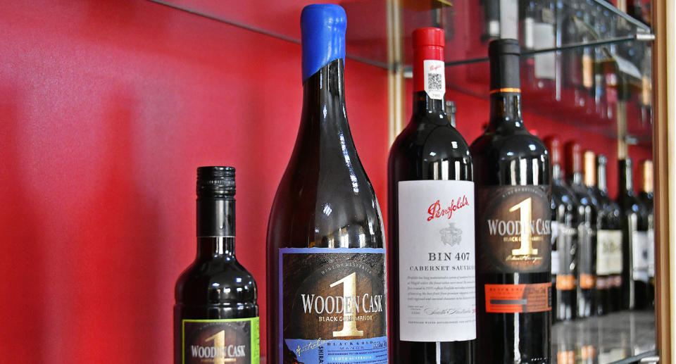 Australian wines shown on a shelf.