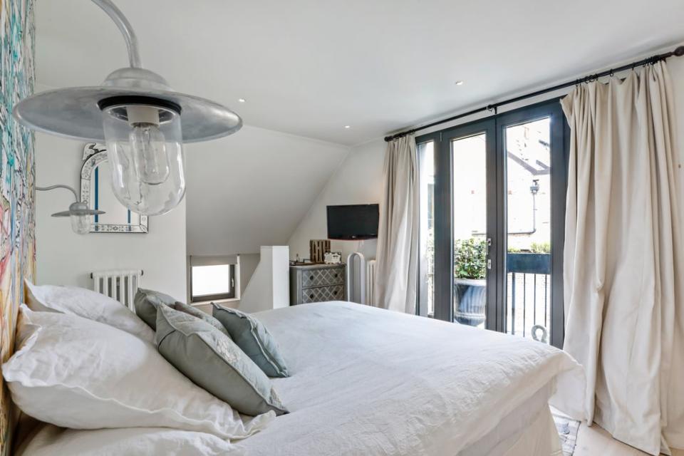 The master bedroom boasts direct access to its own outdoor space (JLL Residential)