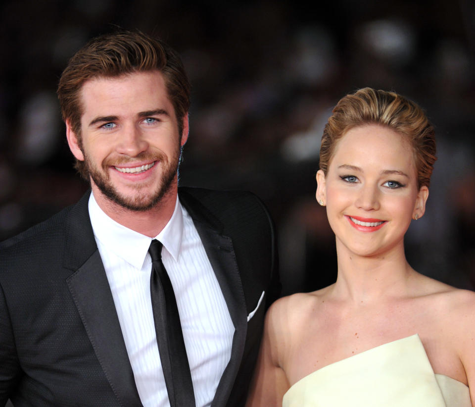 Jennifer Lawrence, Liam Hemsworth. Photo by Camilla Morandi/Corbis via Getty Images