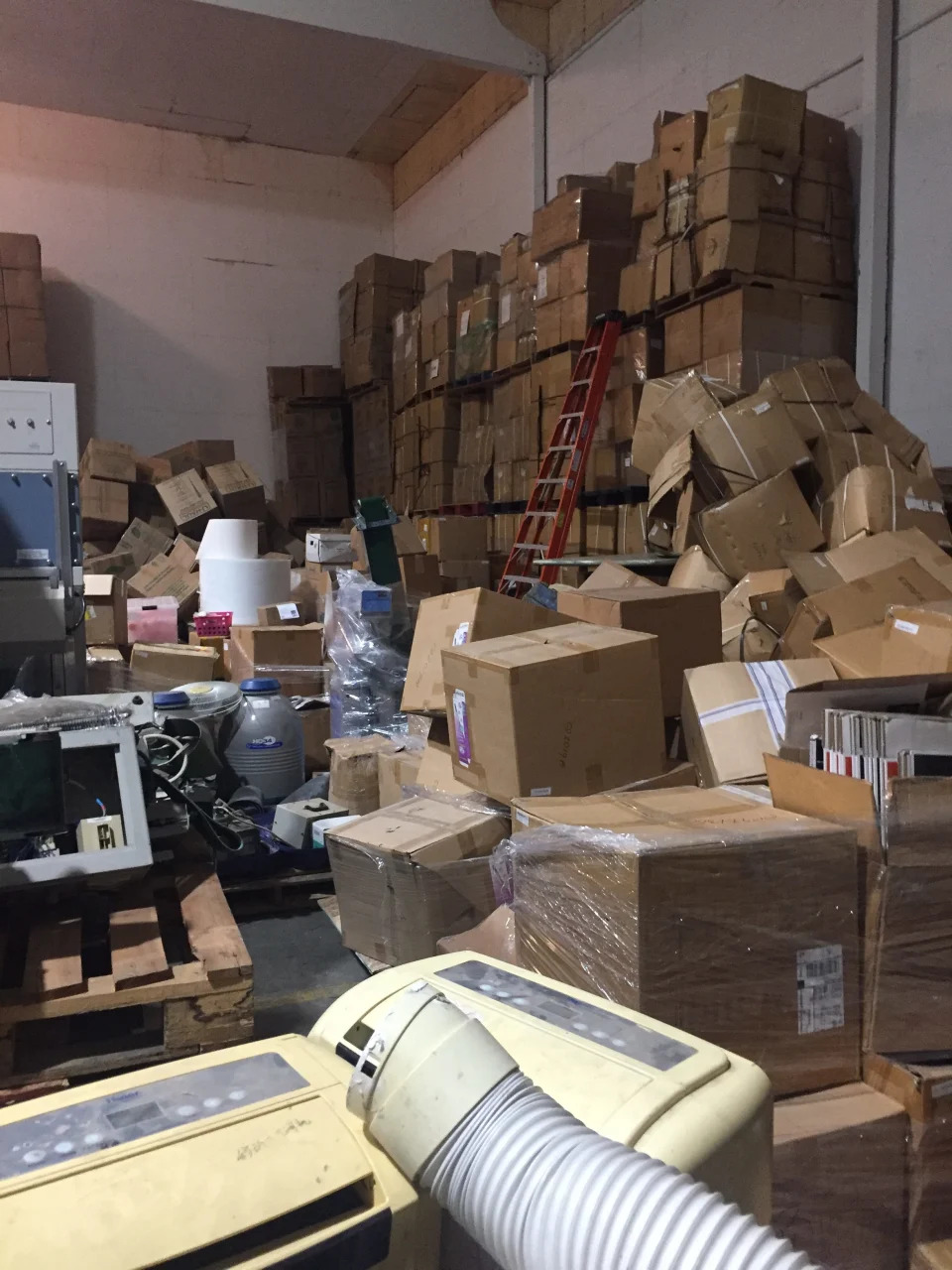 Inside the warehouse in Reedley, California, where furniture, medical devices and other materials were improperly stored.