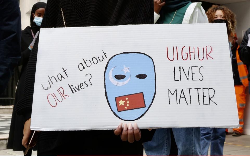 People protest China's persecution of Uighurs in front of the Chinese Embassy in London - Hasan Esen/Anadolu Agency via Getty Images