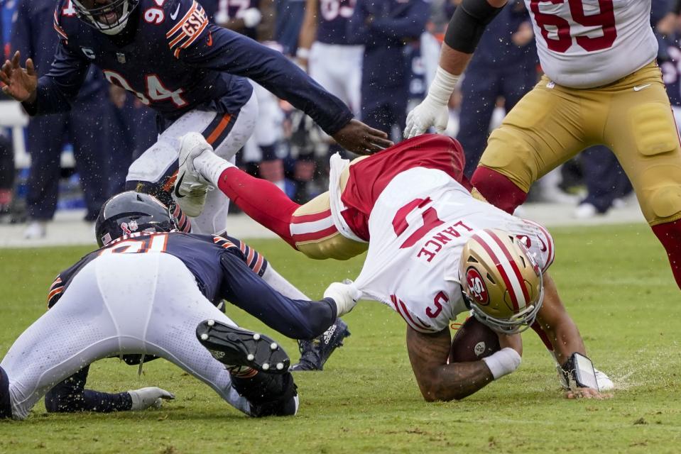 Chicago Bears' Dominique Robinson sacks San Francisco 49ers' Trey Lance during the first half of an NFL football game Sunday, Sept. 11, 2022, in Chicago. (AP Photo/Charles Rex Arbogast)