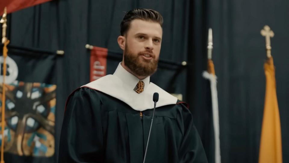 PHOTO: Harrison Butker speaks to the 2024 graduates of Benedictine College, May 11, 2024, in Atchison, Kan. (Benedictine College/YouTube)