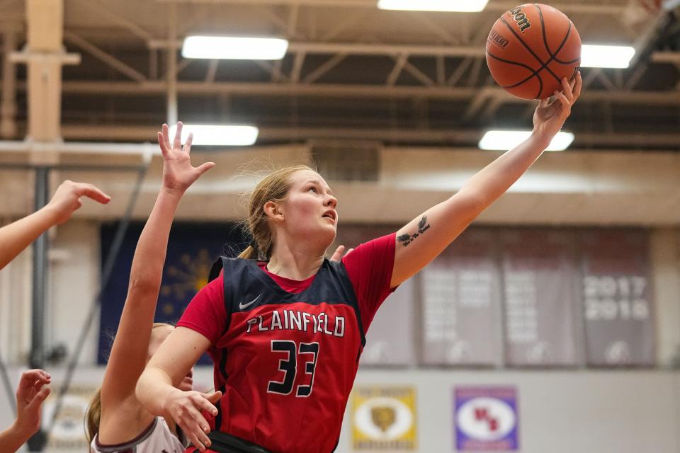 Plainfield Quakers forward Payton Benge (33) recovers a rebound Saturday, Jan. 6, 2024, during the game at Danville Community High School in Danville.