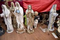Devotion to the Grim Reaper-like Santa Muerte (Holy Death) in Mexico is growing fast despite the Vatican's rejection of the figure as blasphemous