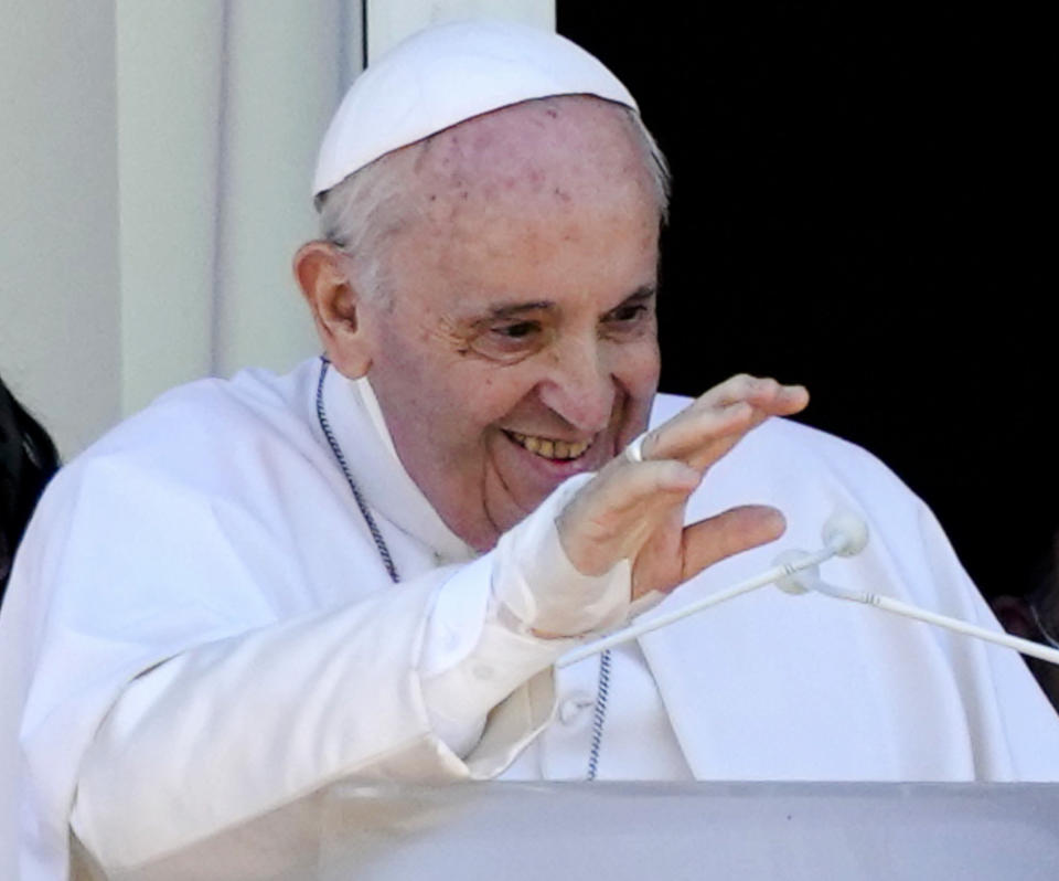 FILE - Pope Francis appears with young oncologic patients on a balcony of the Agostino Gemelli Polyclinic in Rome, July 11, 2021. Pope Francis is celebrating his 85th birthday Friday, Dec. 17, 2021, a milestone made even more remarkable given the coronavirus pandemic, his summertime intestinal surgery and the weight of history: His predecessor retired at this age and the last pope to have lived any longer was Leo XIII over a century ago. (AP Photo/Alessandra Tarantino, file)