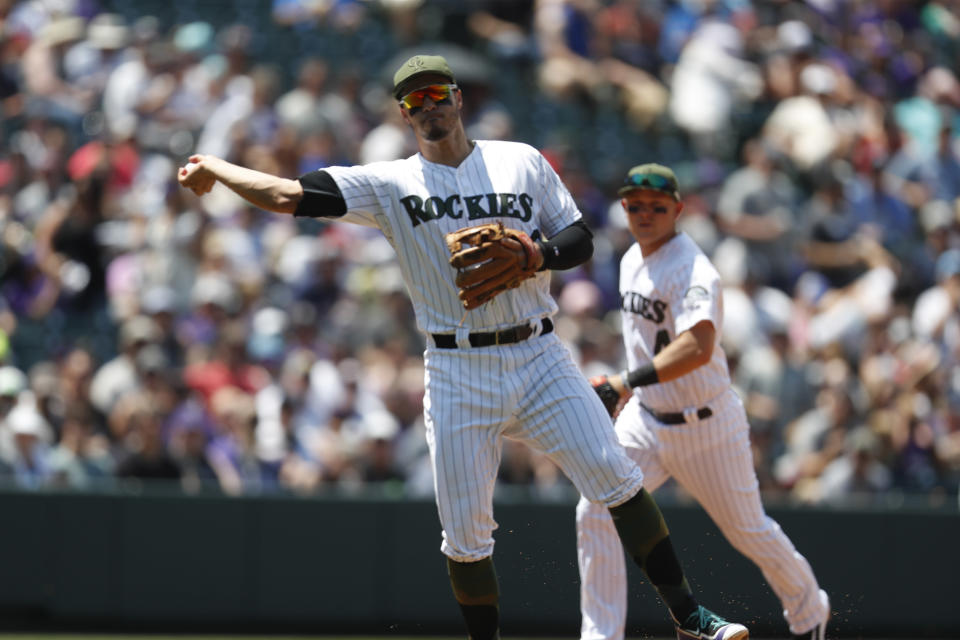 Nolan Arenado has won the Gold Glove at third base in each of his four seasons in the majors. (AP)