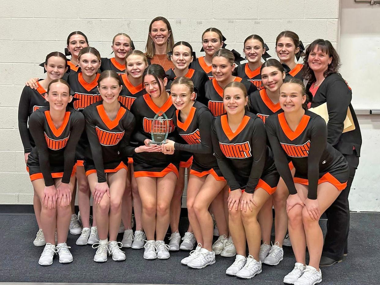 The Quincy Oriole competitive cheer team won the Big 8 conference championship this season