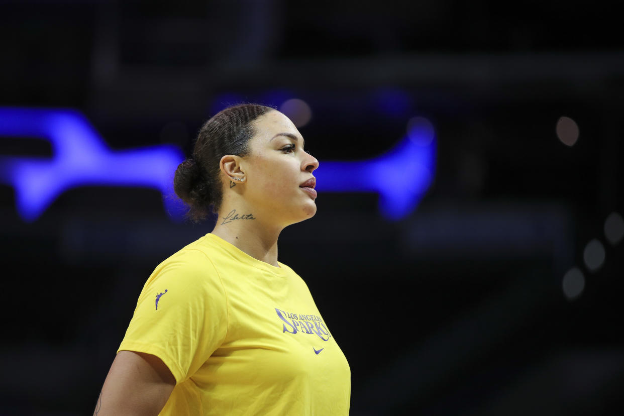 LOS ANGELES, CALIFORNIA - JUNE 11: Center Liz Cambage #1 of the Los Angeles Sparks looks on during warm ups before the game against the Las Vegas Aces at Crypto.com Arena on June 11, 2022 in Los Angeles, California. NOTE TO USER: User expressly acknowledges and agrees that, by downloading and or using this photograph, User is consenting to the terms and conditions of the Getty Images License Agreement. (Photo by Meg Oliphant/Getty Images)