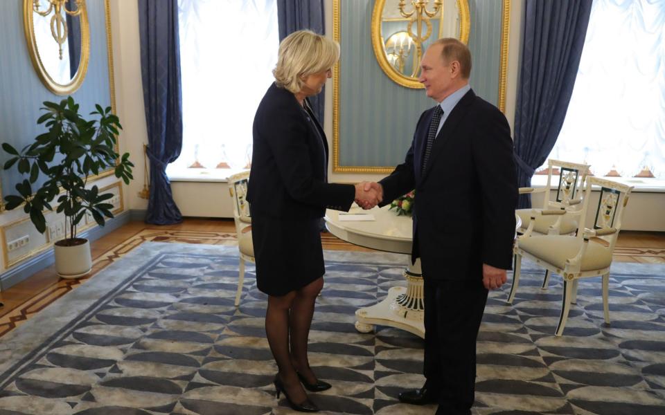 Russian President Vladimir Putin meets with French presidential election candidate for the far-right Front National (FN) party Marine Le Pen at the Kremlin in Moscow - Credit:  MIKHAIL KLIMENTYEV/AFP